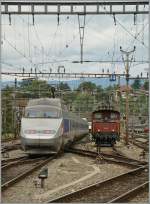 TGV Lyria and Ee 3/3 in Lausanne.