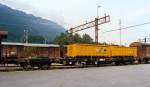 SBB-CFF Flat Wagon Slps-x used for hauling Roll-off Containers (ACTS Containers), near station Interlaken-Ost (CH), August 1993