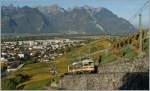 tpc--al-aigle-leysin A-L local train over Aigle.
18.10.2011