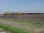 Union Pacific Union Pacific 5988 & 5561 pulls its empty coal train on the BNSF main line near Middletown, Iowa 15 Apr 2005.