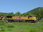 Union Pacific Union Pacific 6063 leads a loaded coal train down the hill near Rollinsville, Colorado on 1 July 2005.