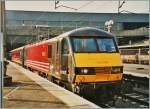 Virgin Class 90 002 in London Euston waits on the departure.
16.05.2000/pictured picture 