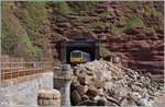 The Great Western Railway Class 143 618 is comming out of the 521 yd 476 m long Parson's Tunnel between Dawlish and Teignmouth.