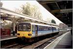 The Wales&West (by National Express) 143623 in the Regional Railways coulors in Cardiff Queen Street / Caerdydd Heol y Frenhines. 

Analog picture rom the Nov. 2000