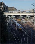 A Scot Rail Class 170 and 158 in Edinburh Waverley Station.