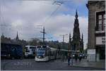 A Edinburgh Tram in the Princes Street, in the background: The Edinburgh Castle.