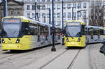 Manchester Metro Link Trams 3018 and 3046 (Bombardier M5000) at Piccadilly Gardens.