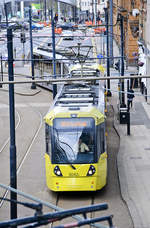 Tram 3042 (Bombardier M5000) from Manchester Metrolink. The Picture is taken from the Pedestrian Bridge over London Road.
Date: March 11, 2018.