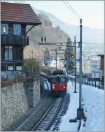 zb-zentralbahn-brunig The De 4/4 110 022-1 is leaving Brienz Station. 
05.02.2011 