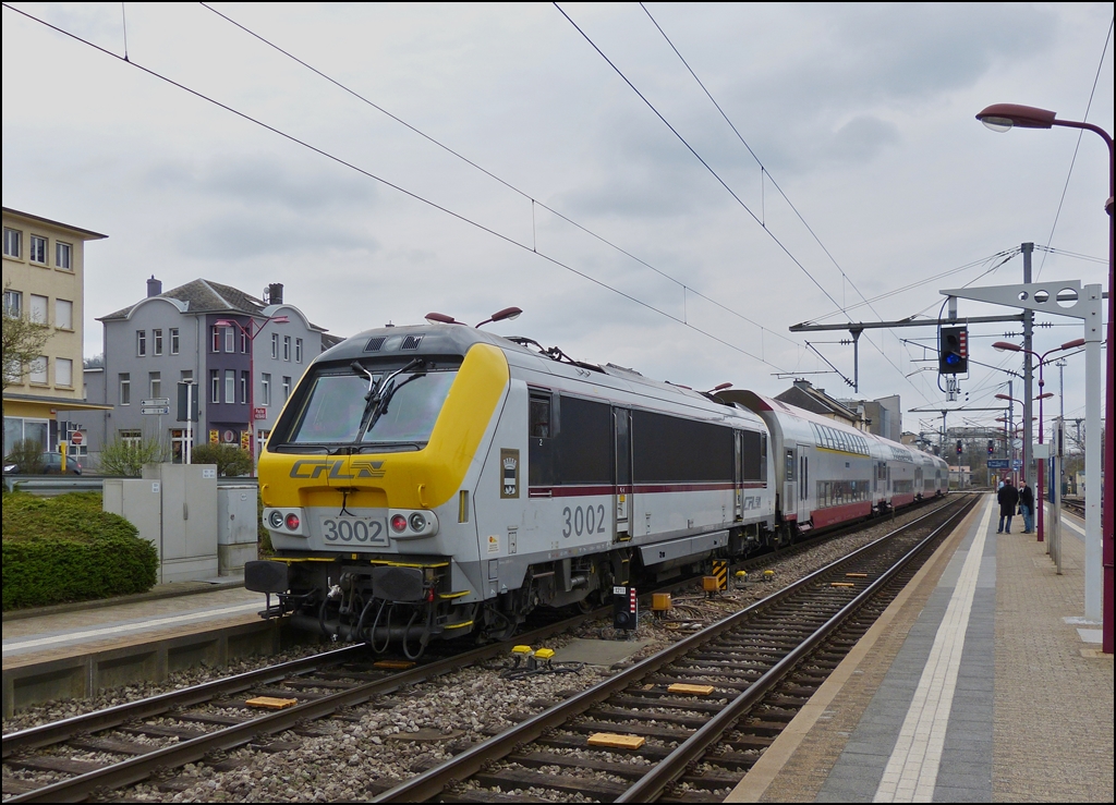 . 3002 photographed with bilevel cars in Rodange on April 20th, 2013.