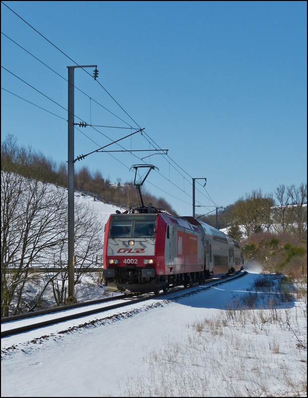 . 4002 photographed with bilevel cars near Maulusmühle on March 13th, 2013.