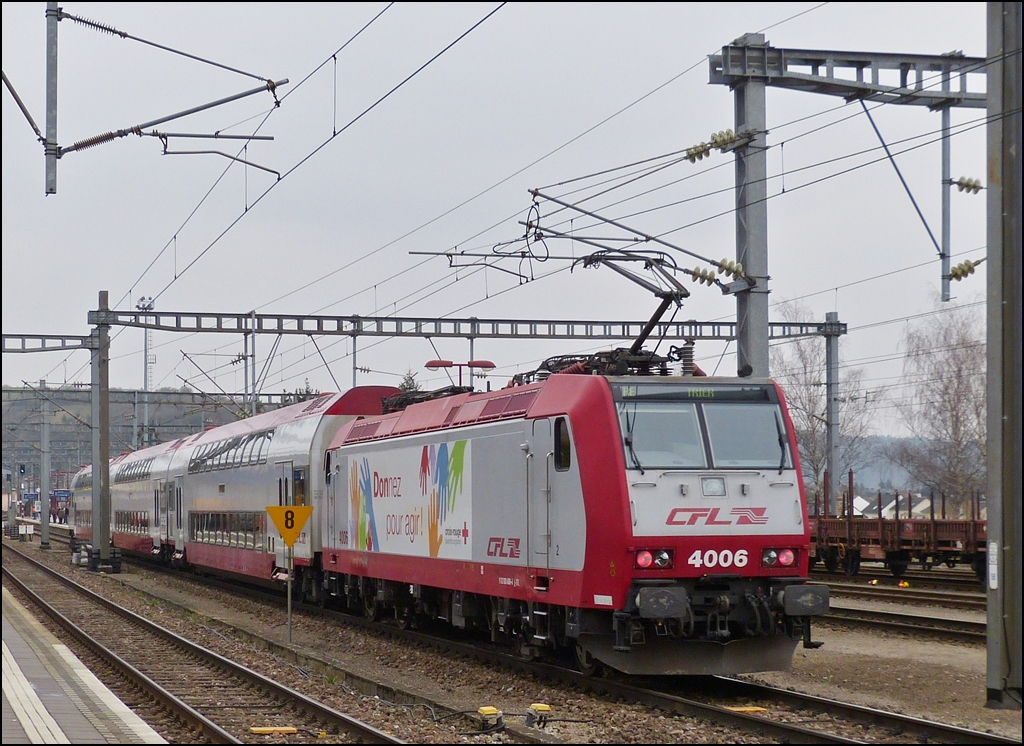 . 4006 is pushing a local train to Trier into the station of Wasserbillig on April 8th, 2013.