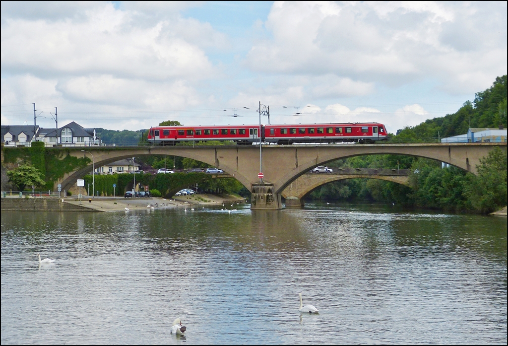 . A local train to Trier is running over the Sre bridge in Wasserbillig on June 14th, 2013.