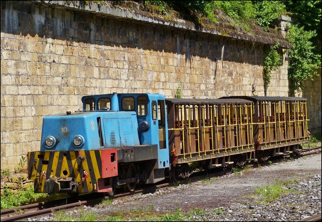 . The diesel locomotive Batiruhr N° 10 with original mining wagons of the mining railway  Miniéresbunn Doihl  (narrow gauge 700 mm) is waiting for passengers in Fond de Gras on June 16th, 2013.