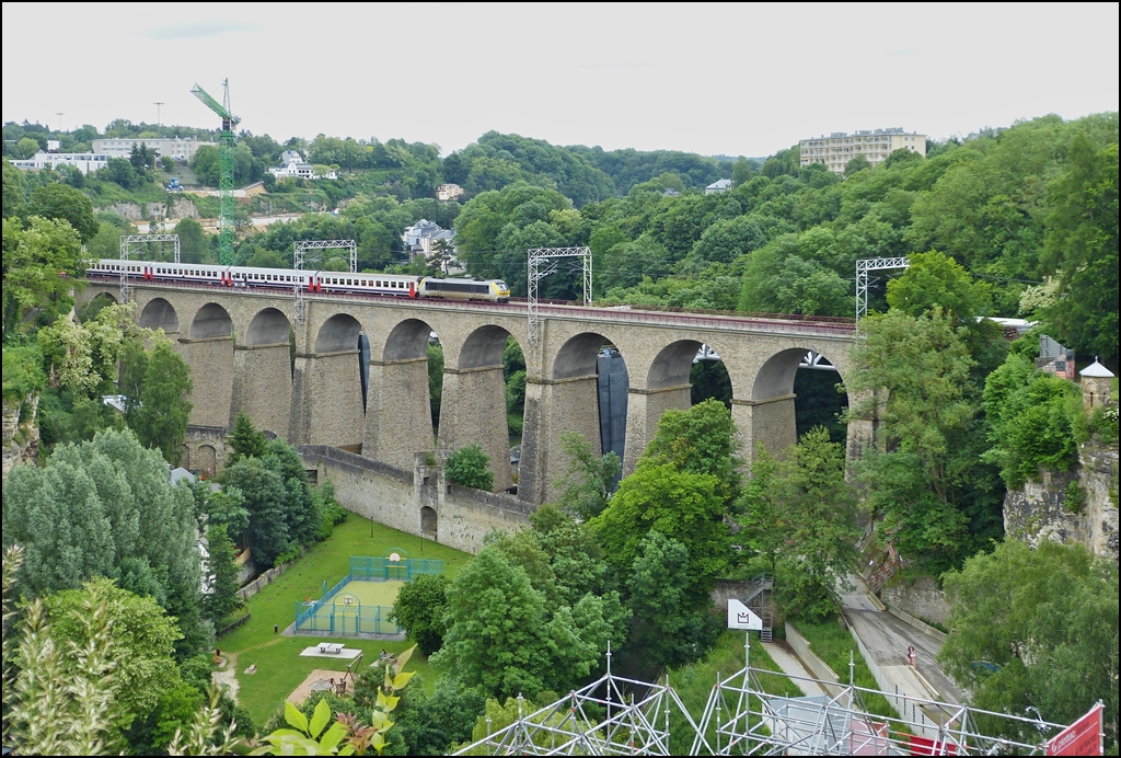 . The IR 115 Liers - Luxembourg City is running on the Pulvermühle viaduct in Luxembourg City on June 14th, 2013.