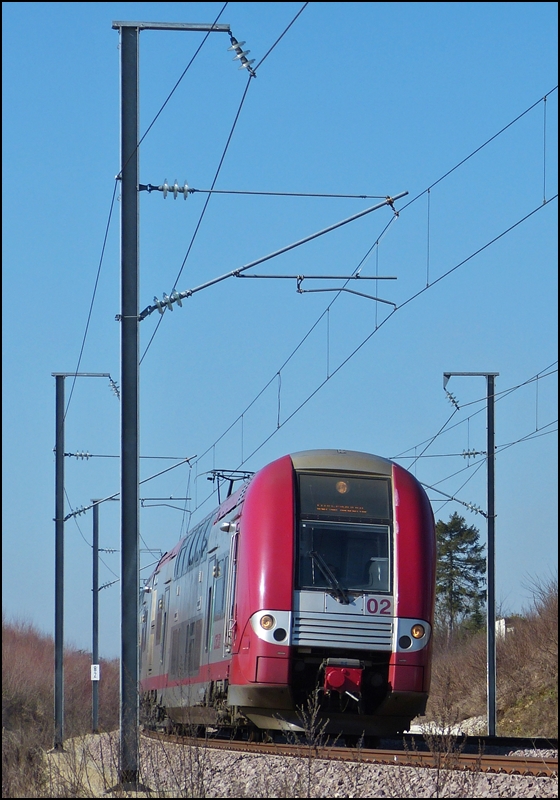 . The RB 4737 Athus (B) - Luxembourg City will soon arrive at the station of Dippach-Reckange on March 4th, 2013.