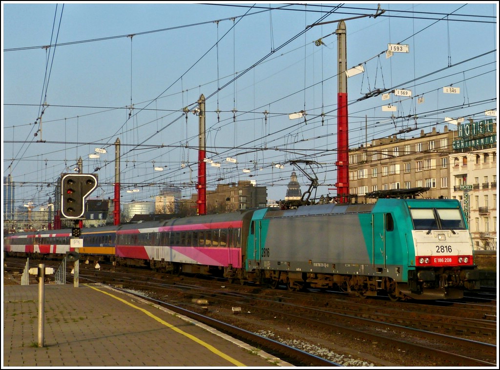 . The TRAXX HLE 2816 with the IC b 9248 Amsterdam CS - Bruxelles Midi is arriving at its final destination on March 23th, 2012.