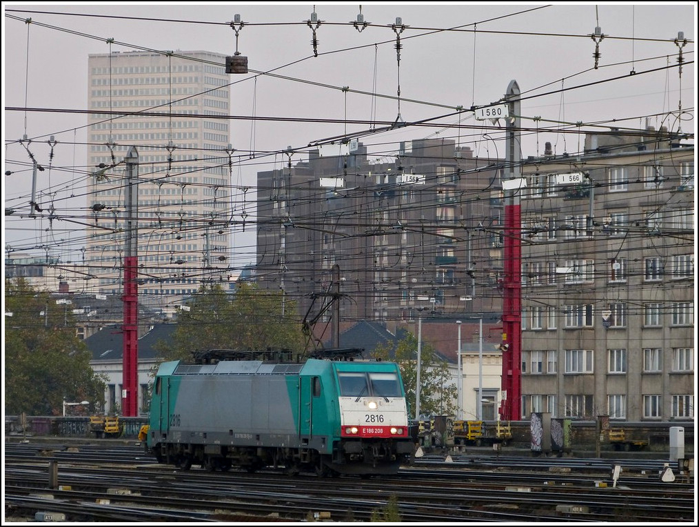 . The TRAXX HLE 2816 is running alone through the station Bruxelles Midi on November 12th, 2011.