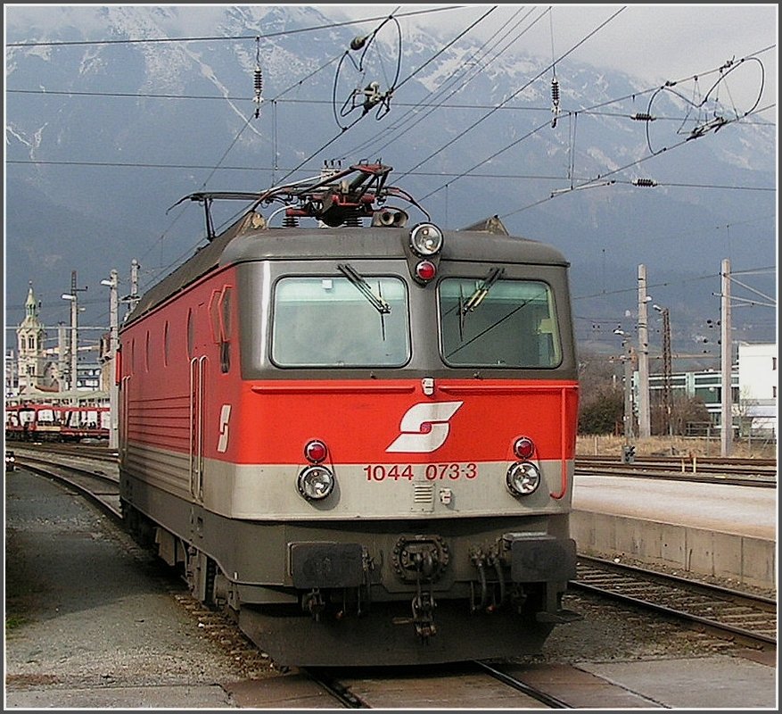 1044 073-3 is running through the station of Innsbruck on March 8th, 2008.