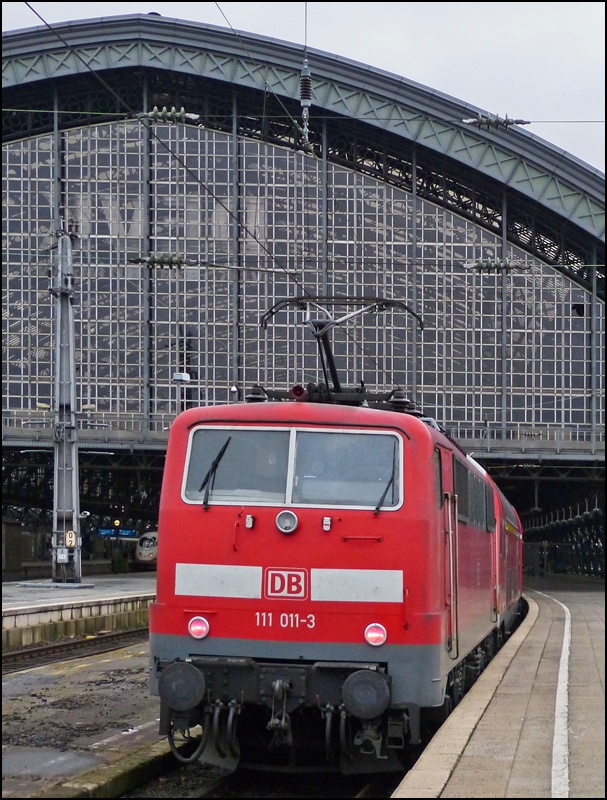 111 011-3 photographed in Cologne main station on December 22nd, 2012.