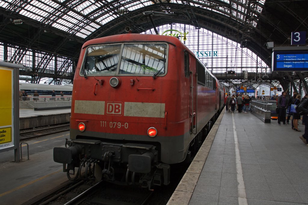 111 079-0 as a pusher locomotive for the RE 09 after Siegen(Rhein-Sieg-Express) on 26/03/2011 (the pulling lokomtive is 111 075-8) in Cologne Main Station.