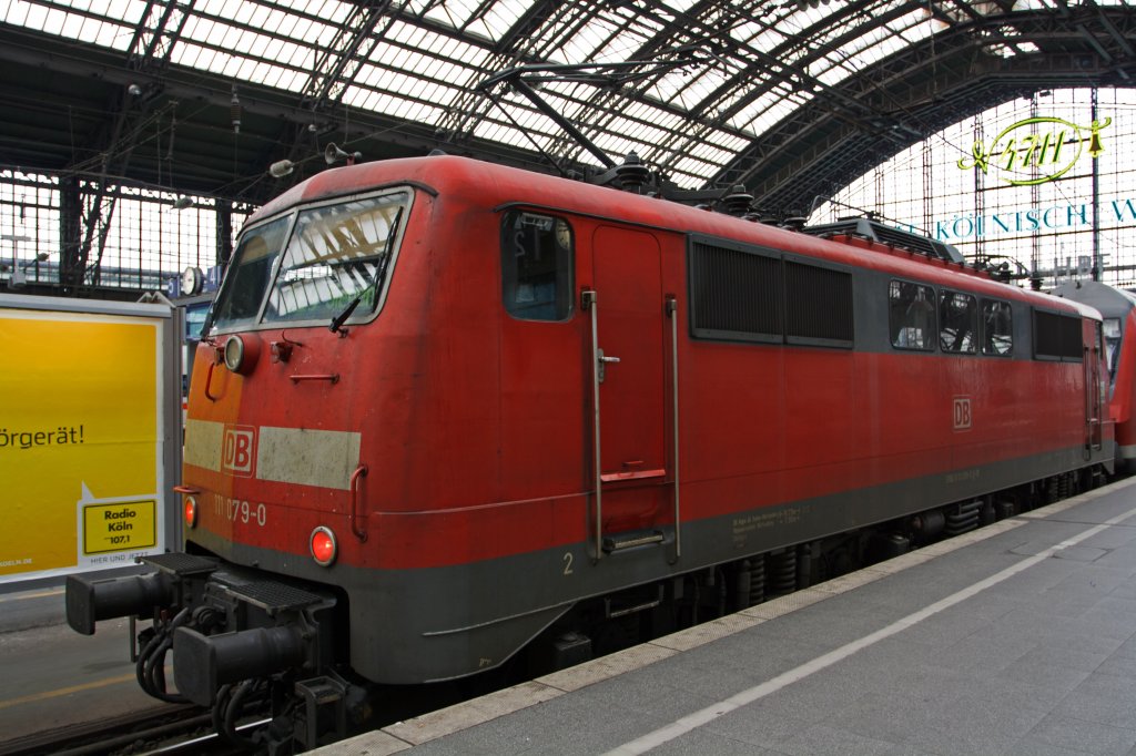 111 079-0 as a pusher locomotive for the RE 09 after Siegen(Rhein-Sieg-Express) on 26/03/2011 (the pulling lokomtive is 111 075-8) in Cologne Main Station.