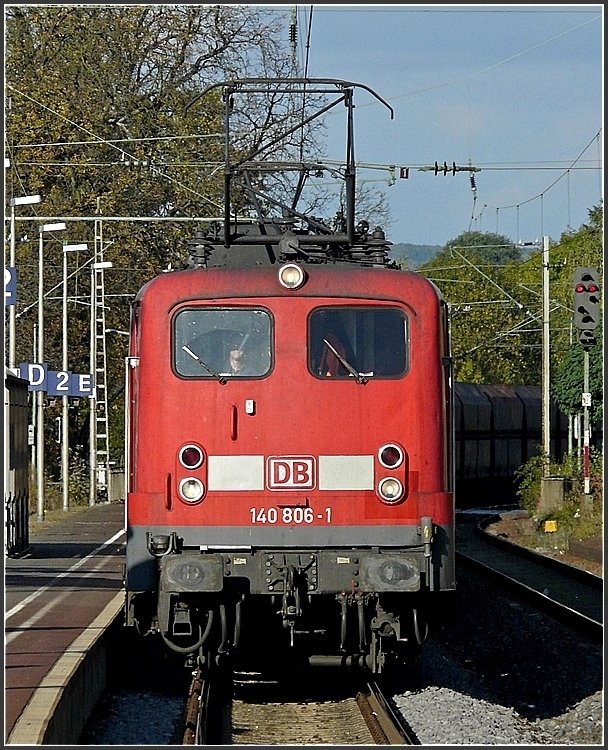 140 806-1 together with a sister engine is hauling a freight train through the station of Saarburg on October 18th, 2009.