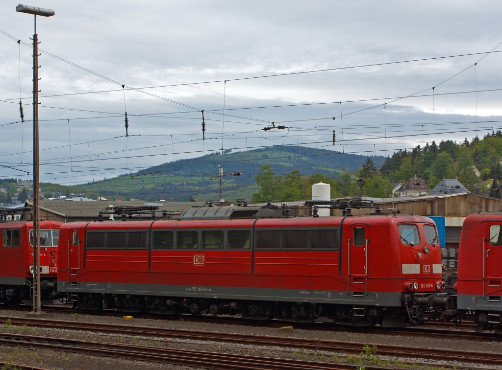 151 147-6 of the DB Schenker Rail parked on 18.05.2012 in Kreuztal.