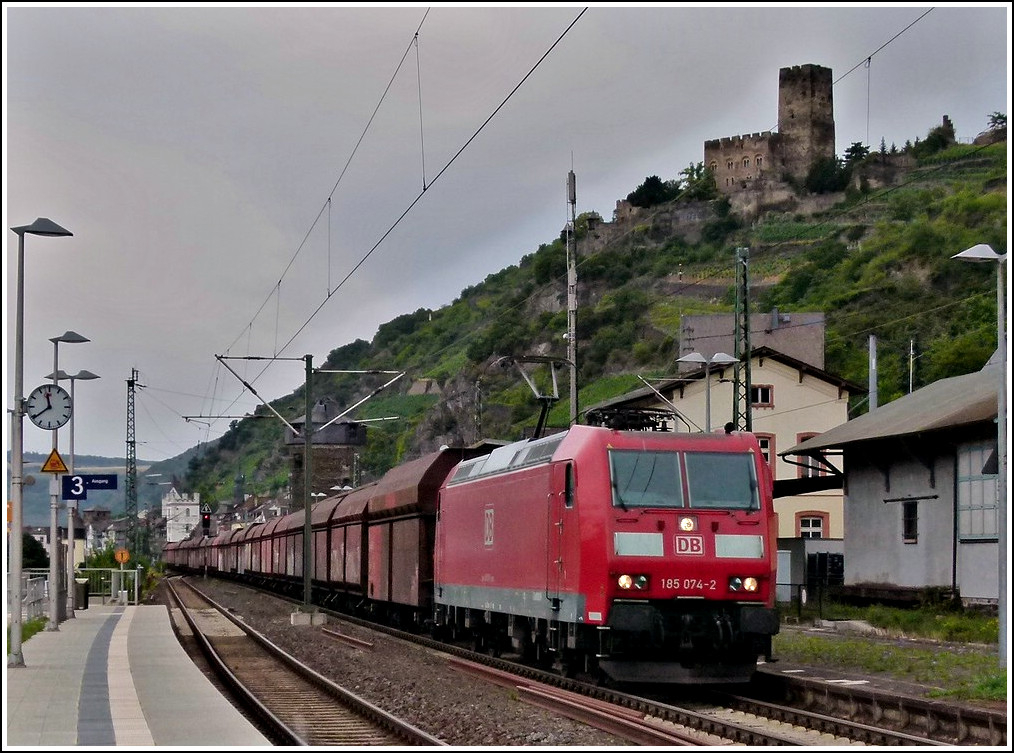 185 074-2 is heading a goods train in Kaub on June 25th, 2011.