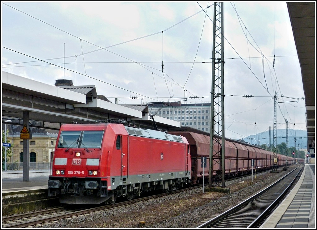 185 379-5 is hauling a freight train through the main station of Koblenz on July 28th, 2012.