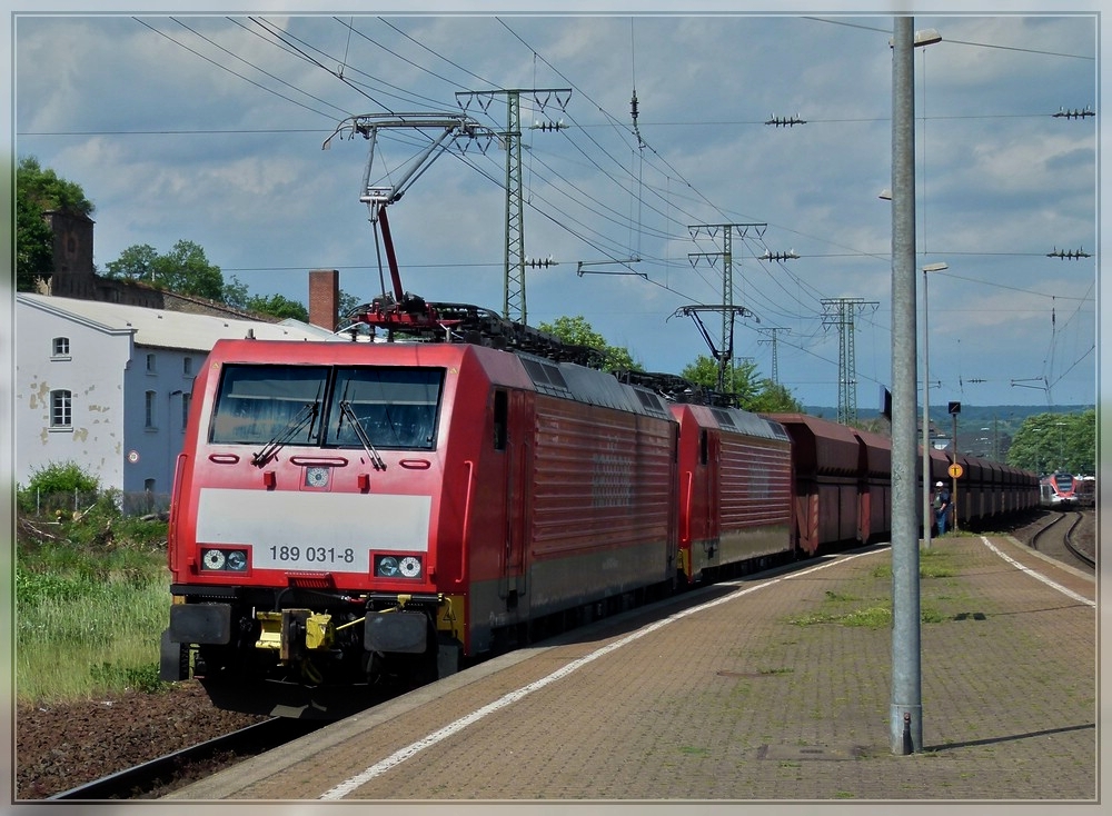 189 double header is hauling a freight train through the station Koblenz-Ltzel on May 22nd, 2011.