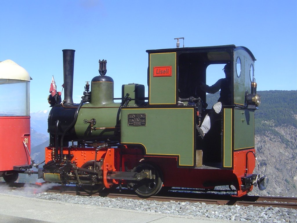 2 ft gauge steam engine  Liseli  (Jung No 1693, built 1911) in service on the high alpin panoramic railway of  Parc d'Attractions du Chatelard (VS)  in Switzerland.
In the station  Les Montuires  on 1'800 metres about sea level. 11 Sept 2010