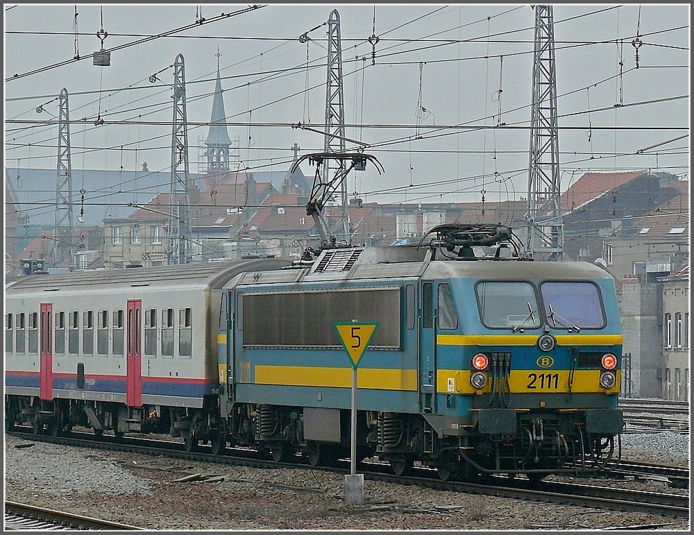 2111 is pushing its train out of the station Bruxelles Nord on February 27th, 2009.