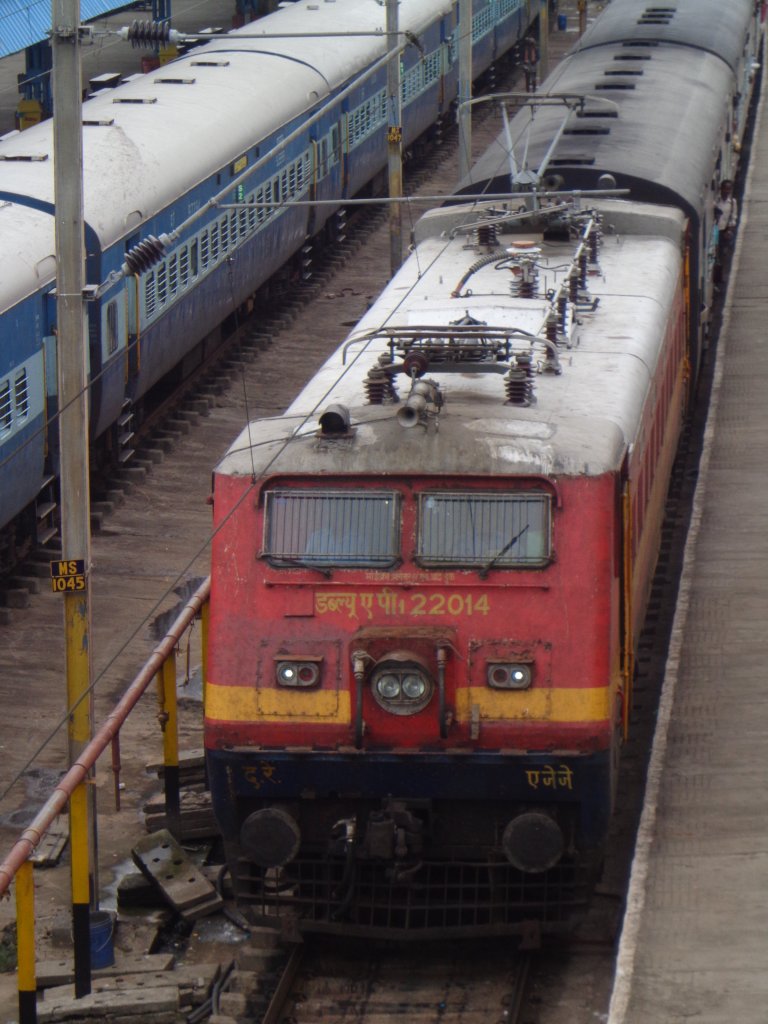 22014 electric locomotive pulling a long distance express is arriving Egmore terminus.