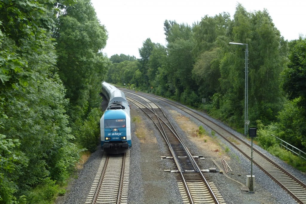 223 062 is driving in Oberkotzau on June 30th 2013.