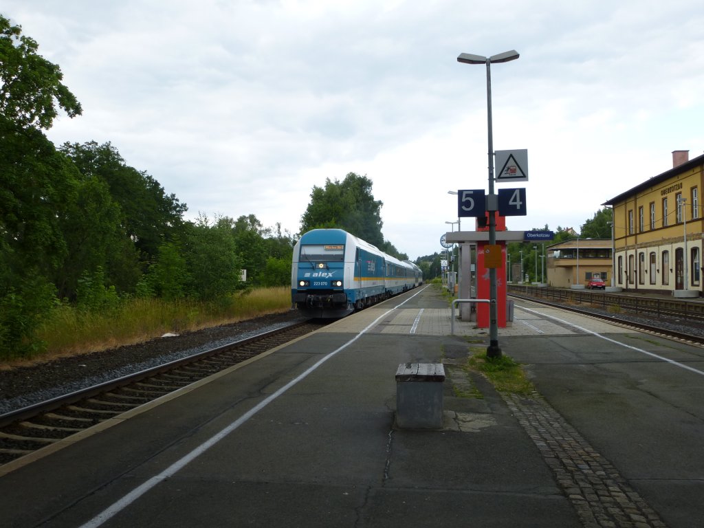 223 070 is driving in Oberkotzu on July 11th 2013.