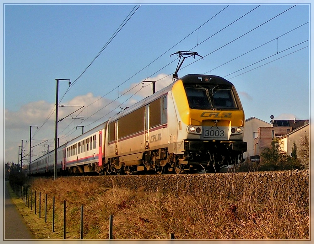 3003 is heading the IR 117 Liers - Luxembourg City near Rollingen/Mersch on November 18th, 2007.