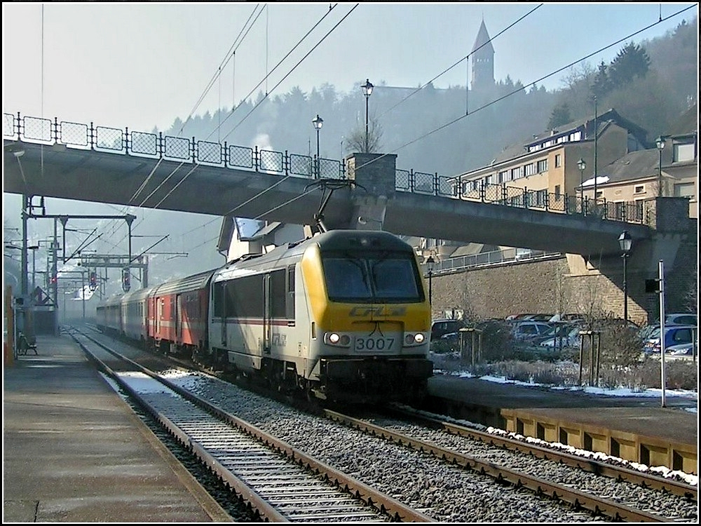 3007 with IR to Liers is leaving the station of Clervaux on the cold morning of March 3rd, 2004.