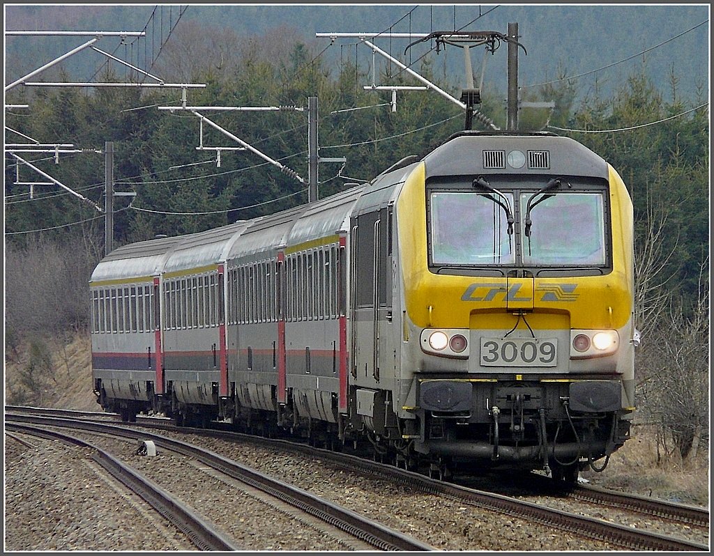 3009 heading the IR Luxembourg-Liers is running through the small village of Honvelez (B) on April 25th, 2009.