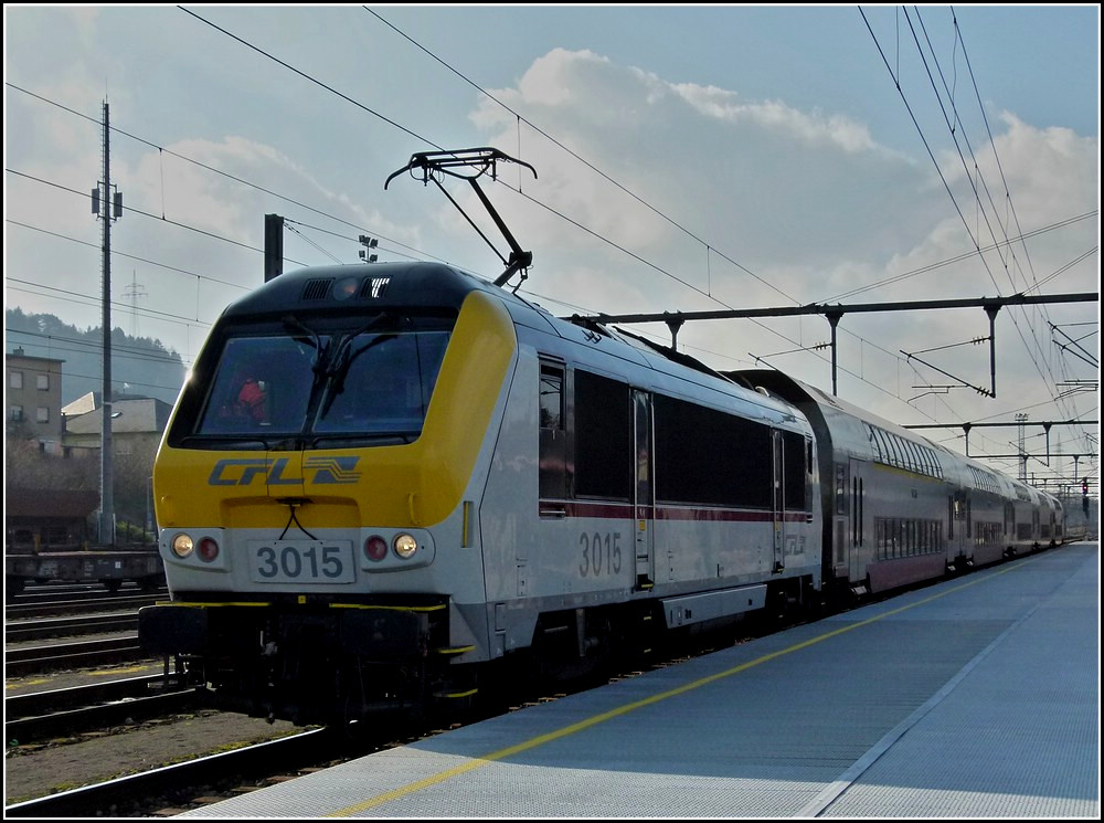 3015 with bilevel cars is leaving the station of Ptange on February 8th, 2011.