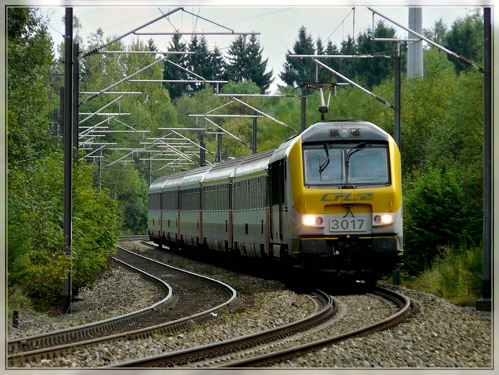 3017 with the IR 114 Luxembourg City - Liers is running between Gouvy and Salmchteau on September 6th, 2009.