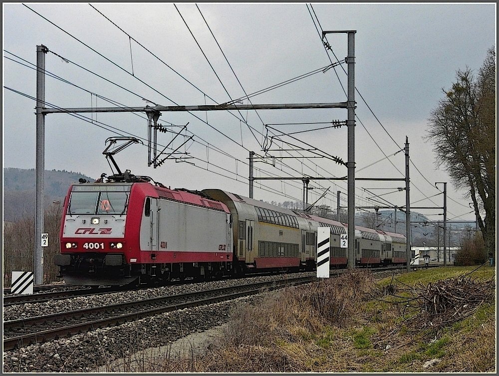4001 with bilevel cars is running near Schieren on rainy March 14th, 2010.