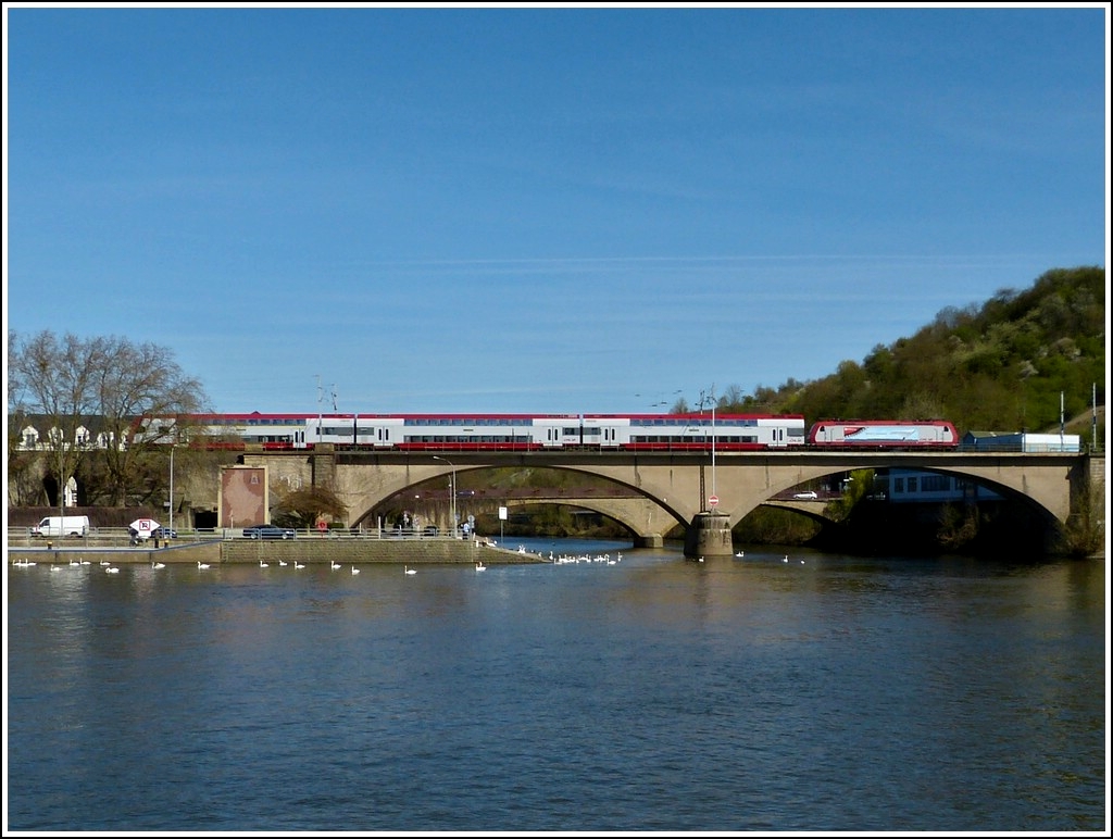 4007 is hauling a local train to Trier over the Sre bridge in Wasserbillig on April 1st, 2012.