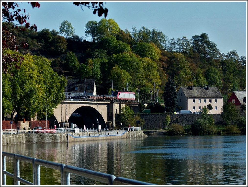 4011 is heading a freight train on the Sre Bridge in Wasserbillig on October 16th, 2011.