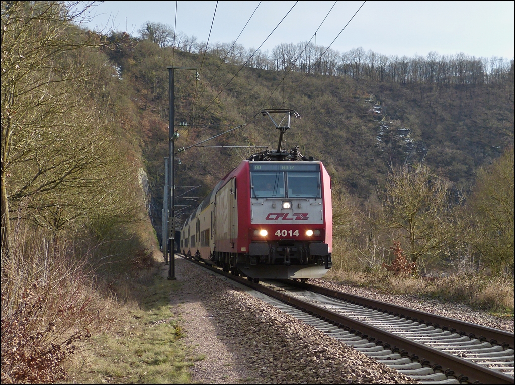 4014 is hauling the RB 3214 Luxembourg City - Wiltz through Michelau on February 21st, 2013.