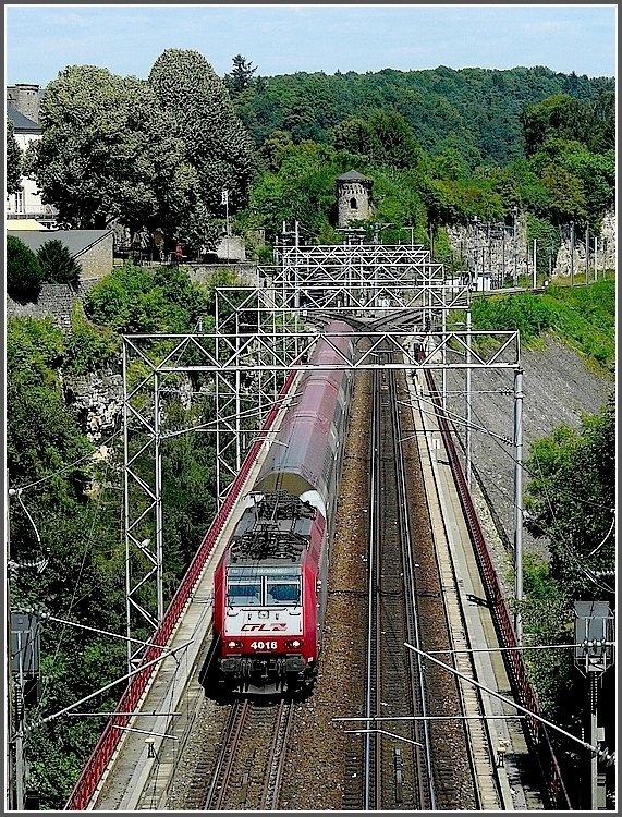 4016 with bilevel cars pictured at the Bisserweg viaduct at Luxembourg City on August 1st, 2009.