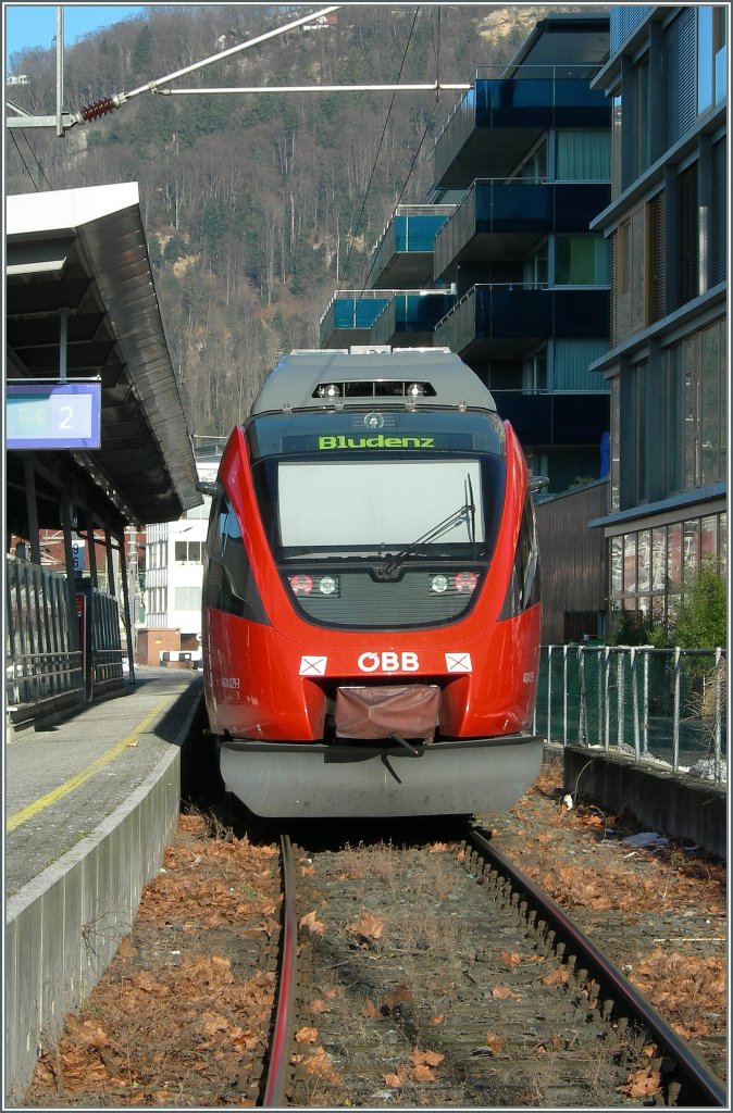 4024 029-3 in the Bregenz Hafen Station. It is the local train to Bludenz, departure 15.18. 
(Picture was token on the open public railway crossing) 
04.02.2007