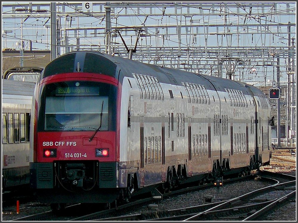 514 031-4 is leaving the main station of Zrich on December 27th, 2009.