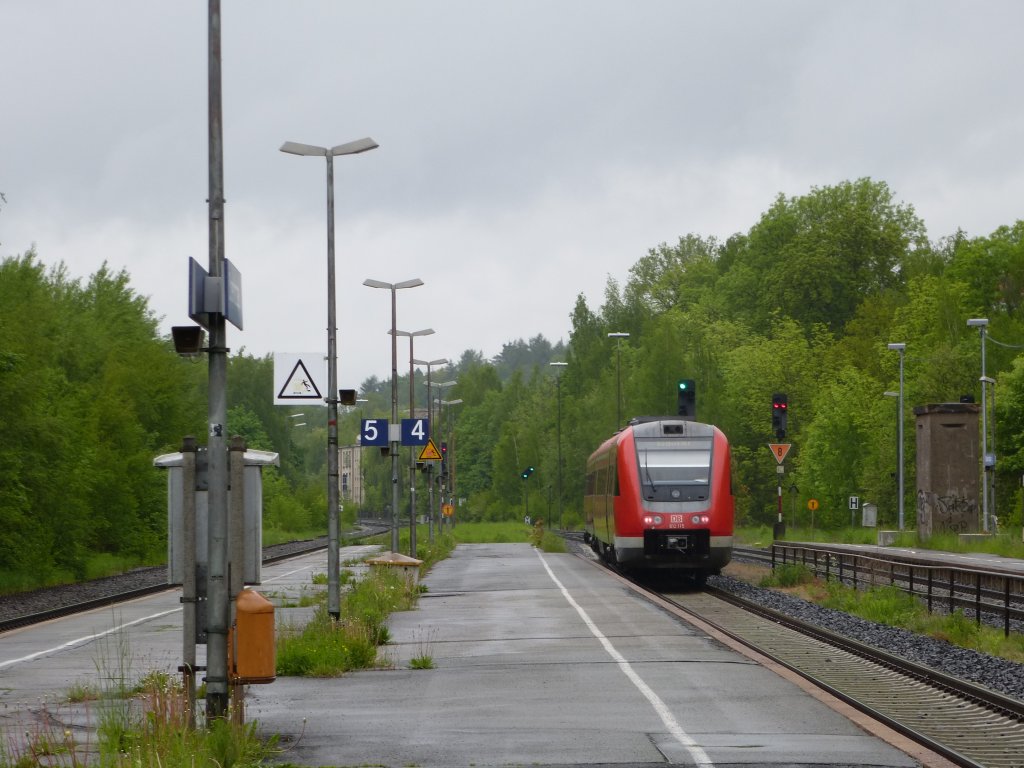 612 115 is driving in Oberkotzau on May 22th 2013.