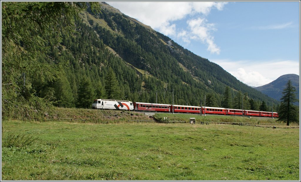 A Albula fast train service from St. Moritz to Chur in the glen of Bever near Spinas. 
12.09.2011